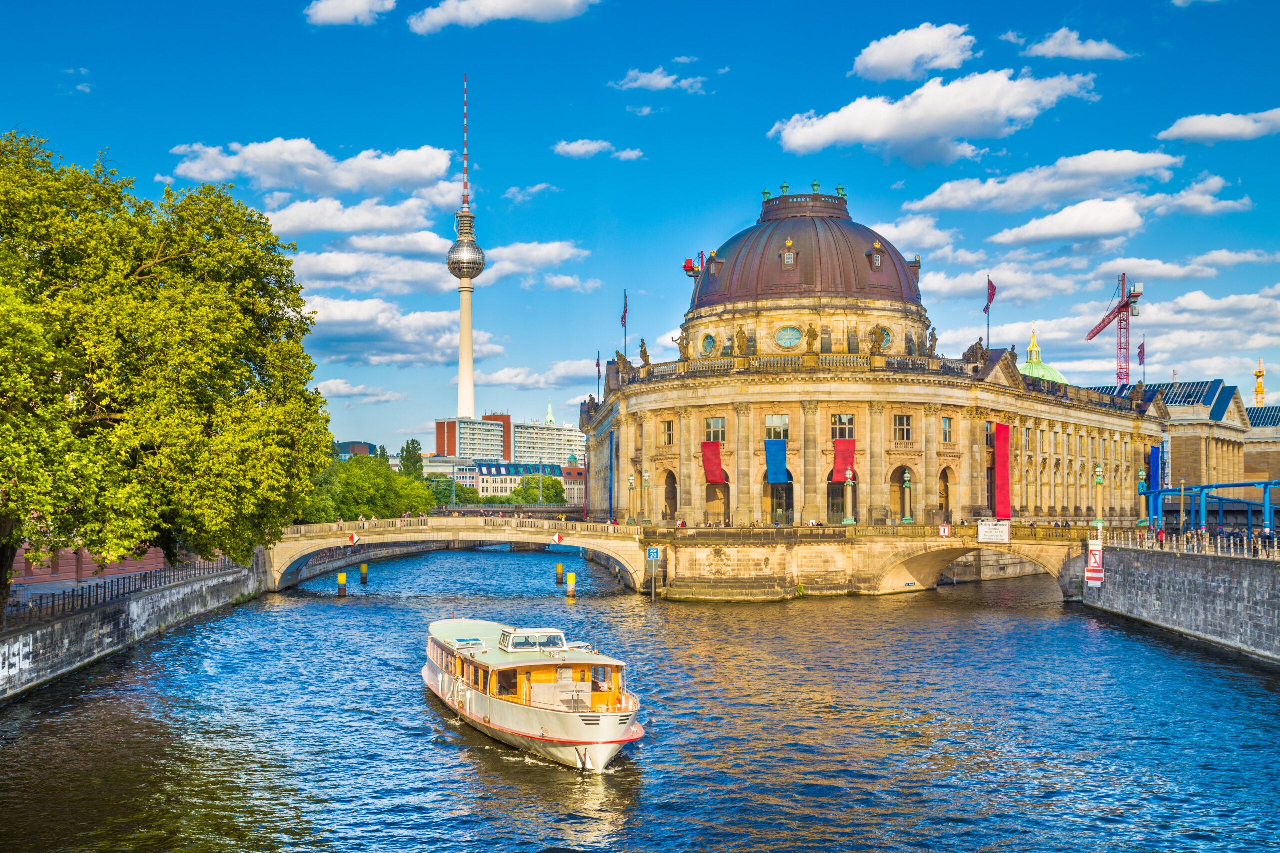 Museumsinsel with TV tower and excursion boat on Spree river at